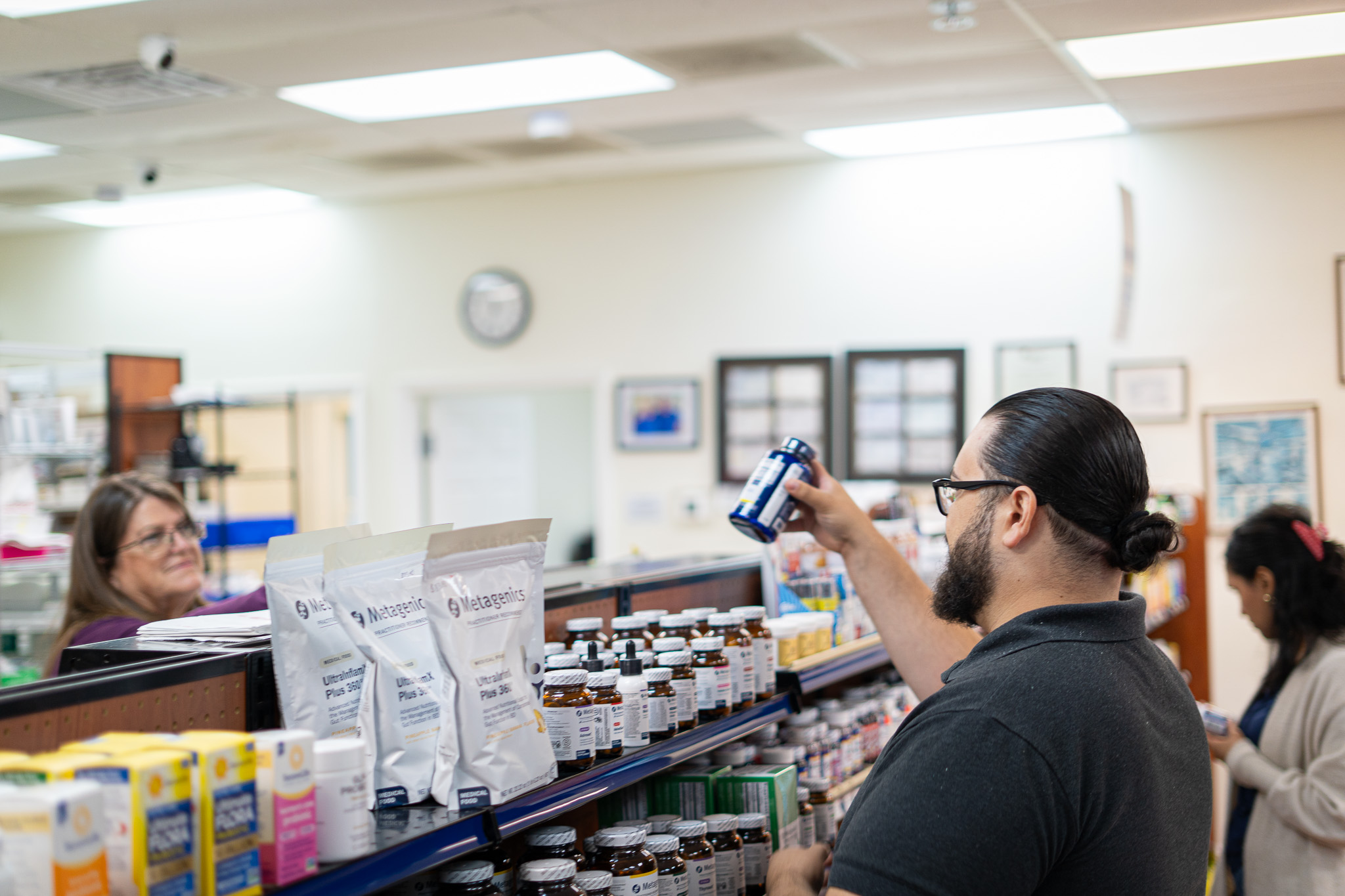 Pharmacist preparing customized medications for an individual patient